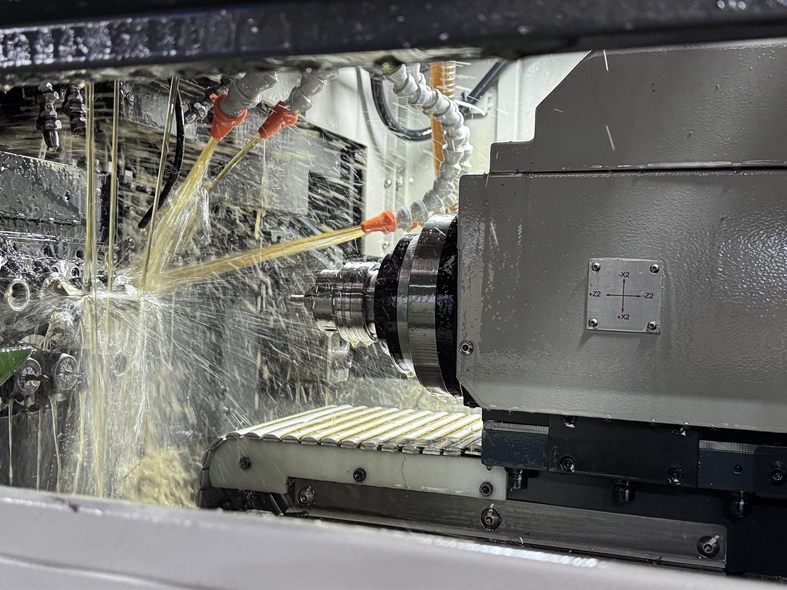 CNC milling machine in operation inside a bright machining workshop